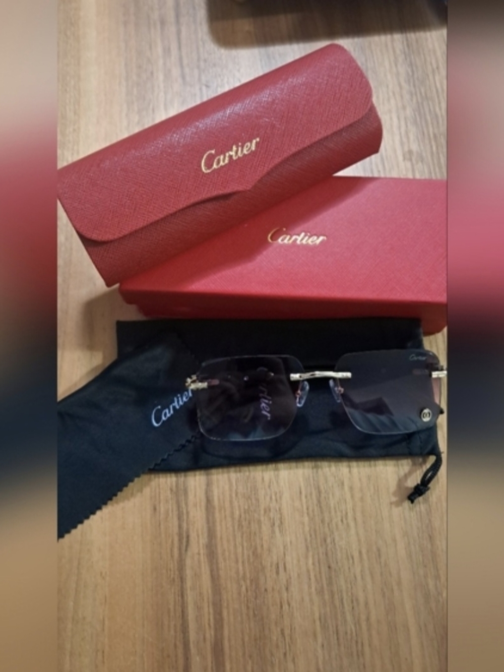Unisex Cartier  Rimless Sunglasses with Black Gradient Lenses and Gold Accents